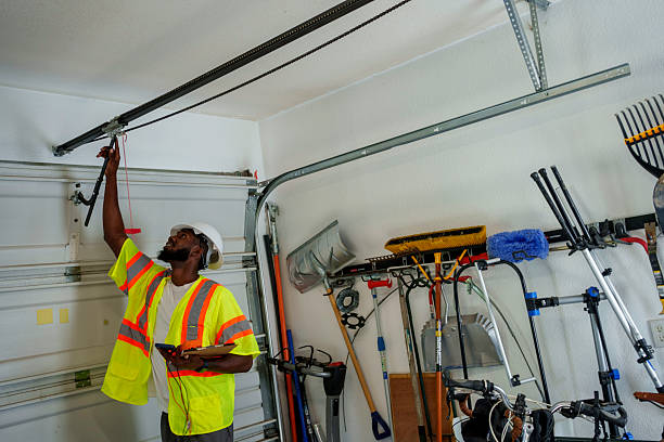 Professional Garage Door Panel Replacement technician working in Etowah, TN